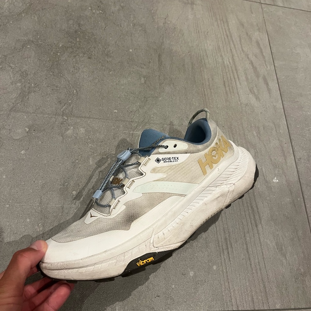 Hoka White and Gold Trail Shoe